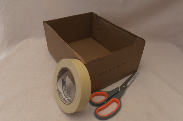 A box, tape, and scissors