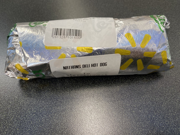 Hot dog in foil wrapper