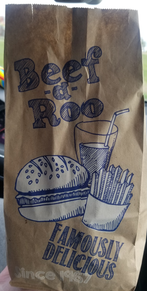 A paper bag full of delicious burger